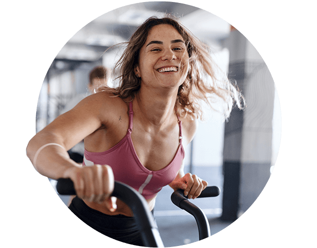 Sportcity korting vrouw op crosstrainer